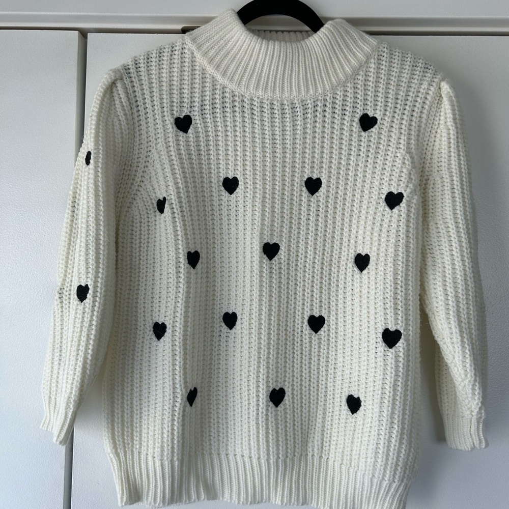Anthropologie Cream Knit Turtleneck 3/4 Sleeve Sweater with Black Heart Details